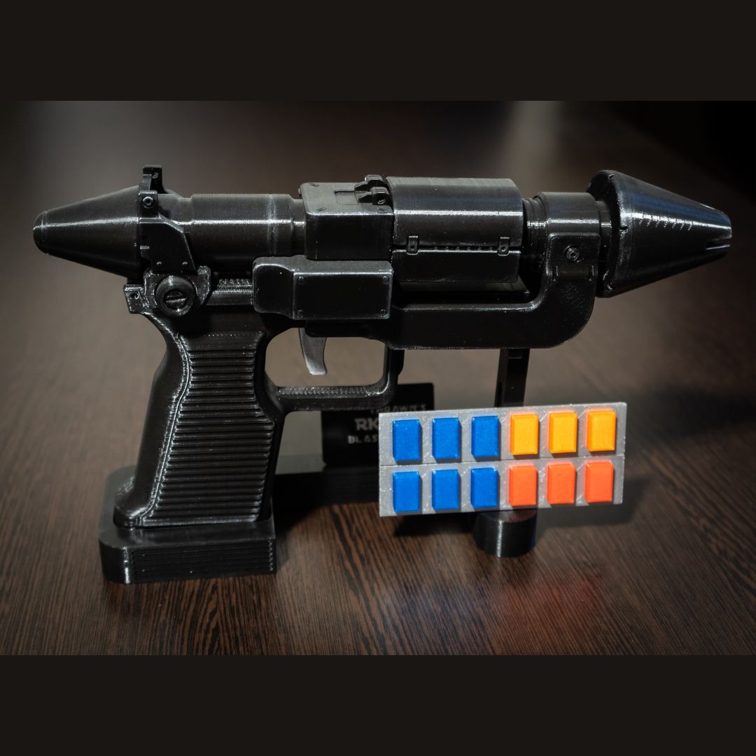 Admiral Thrawn RK-3 blaster pistol replica with detailed black finish and colorful rank bar accessory for Star Wars cosplay