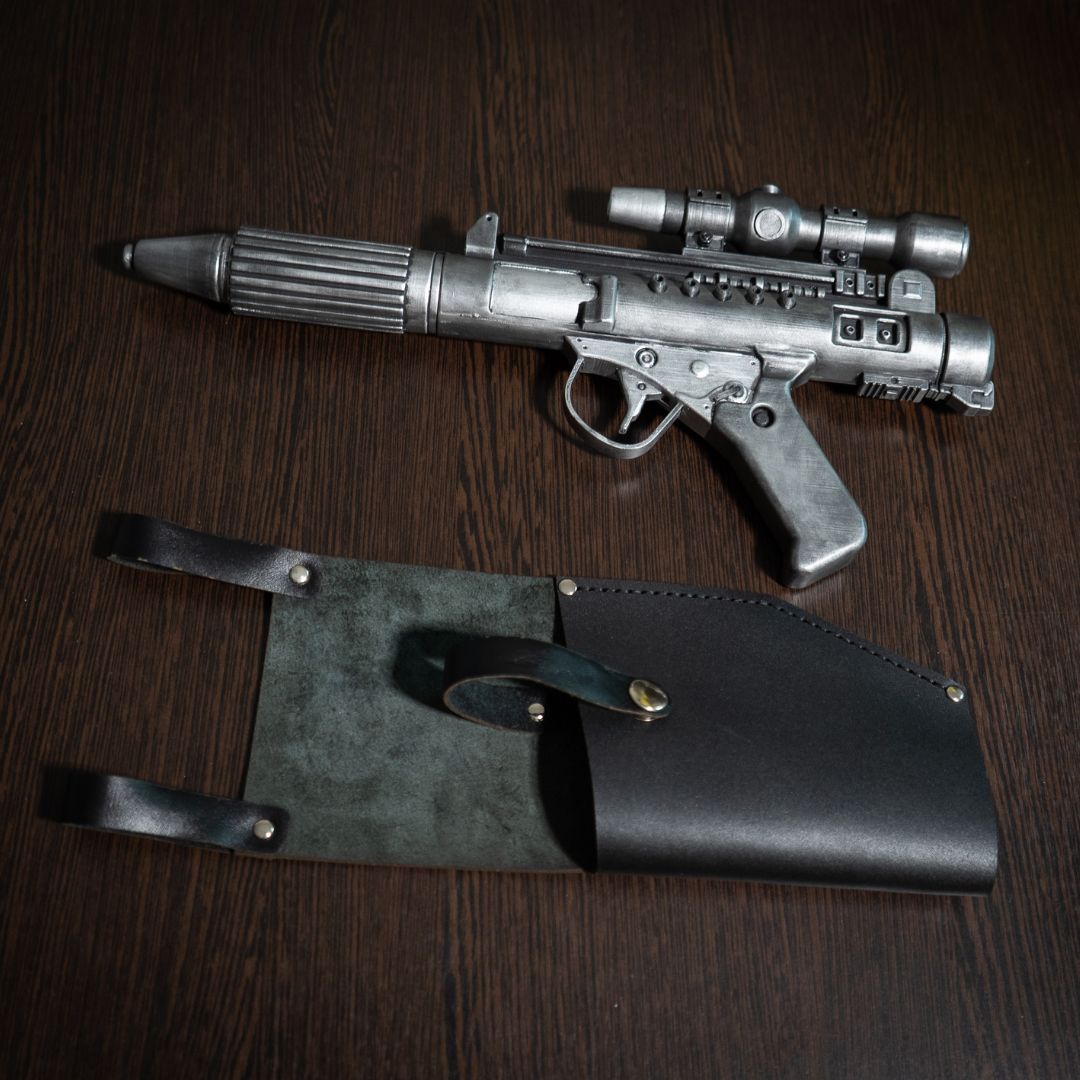 DH-17 blaster pistol with leather holster