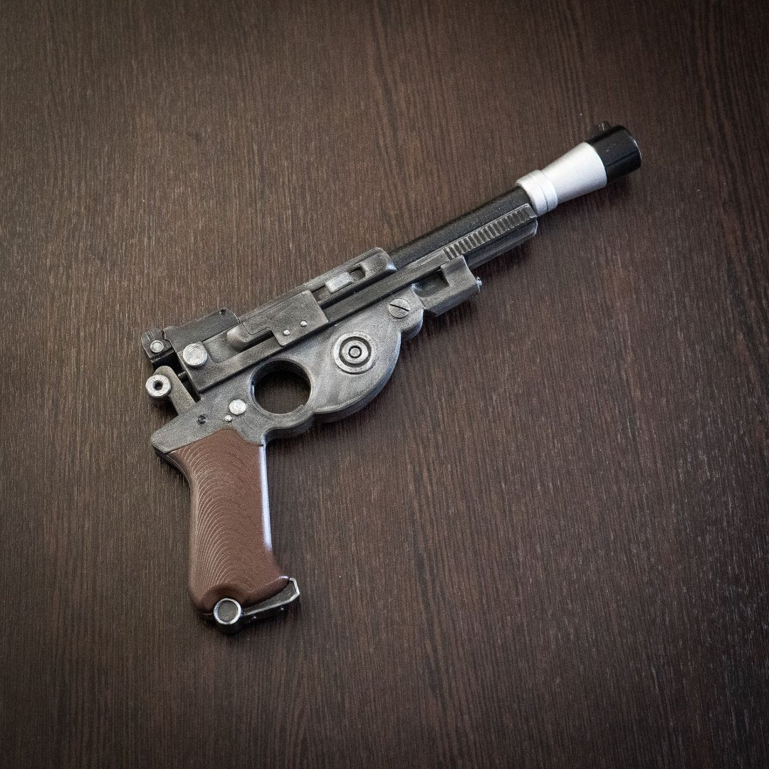 Mandalorian Blaster IB-94 Star Wars replica cosplay prop with detailed design and brown grip on wooden surface