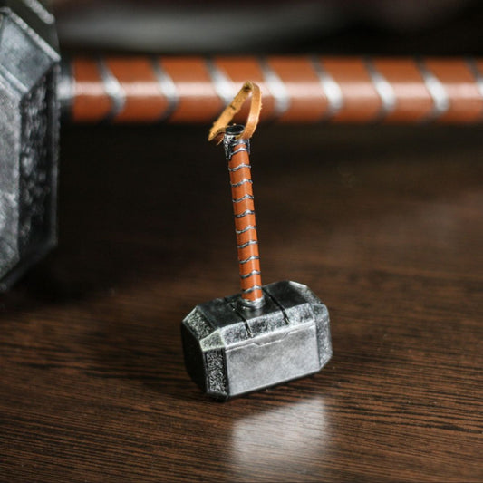 Miniature 1:4 scale Thor hammer replica with detailed resin head and wrapped leather handle