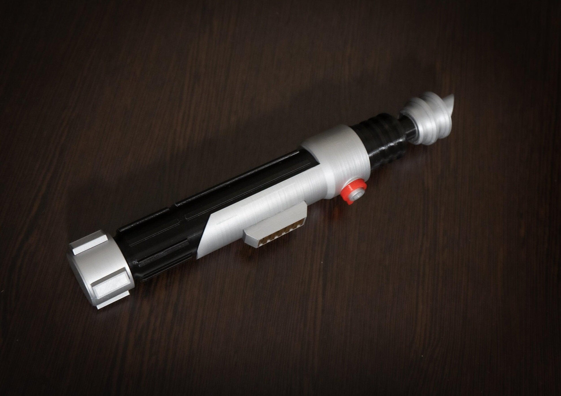 Ezra Bridger second lightsaber hilt cosplay prop in black and silver plastic with red button for Star Wars fans