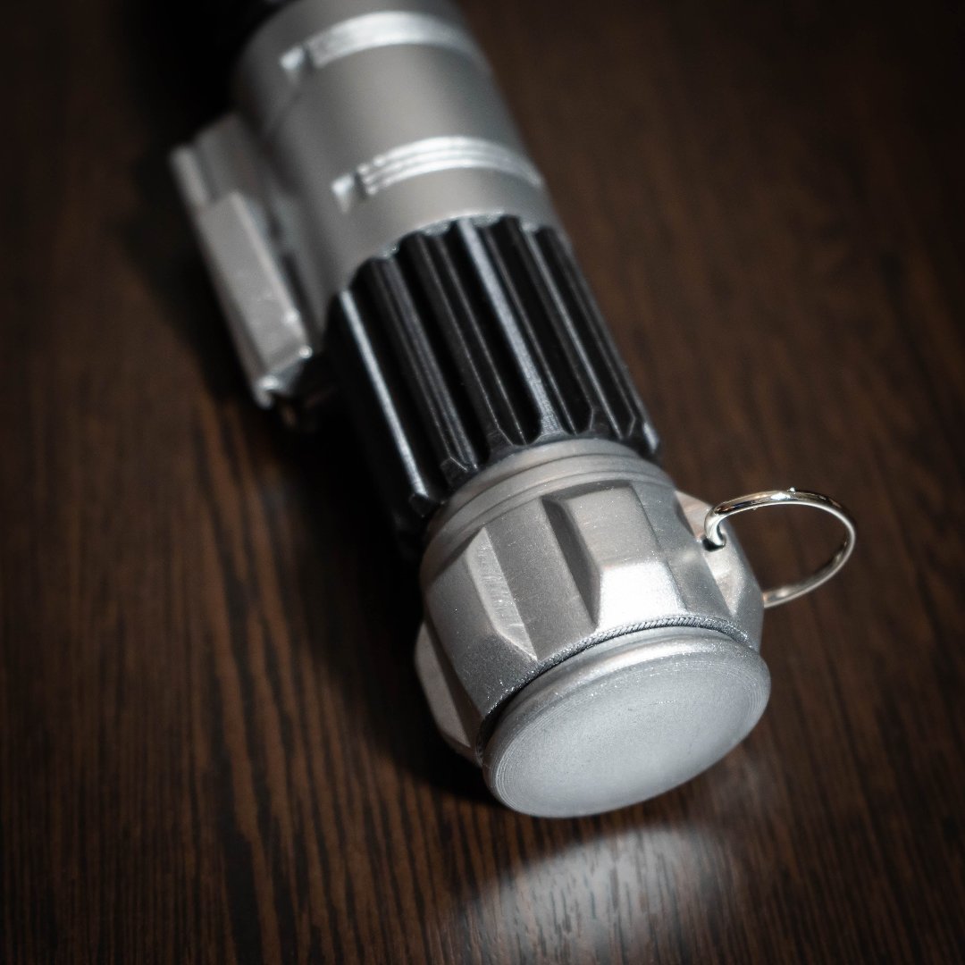 Obi-Wan Kenobi lightsaber cosplay replica from A New Hope, detailed hand-painted design, lightweight plastic build, 11.6 inches long.