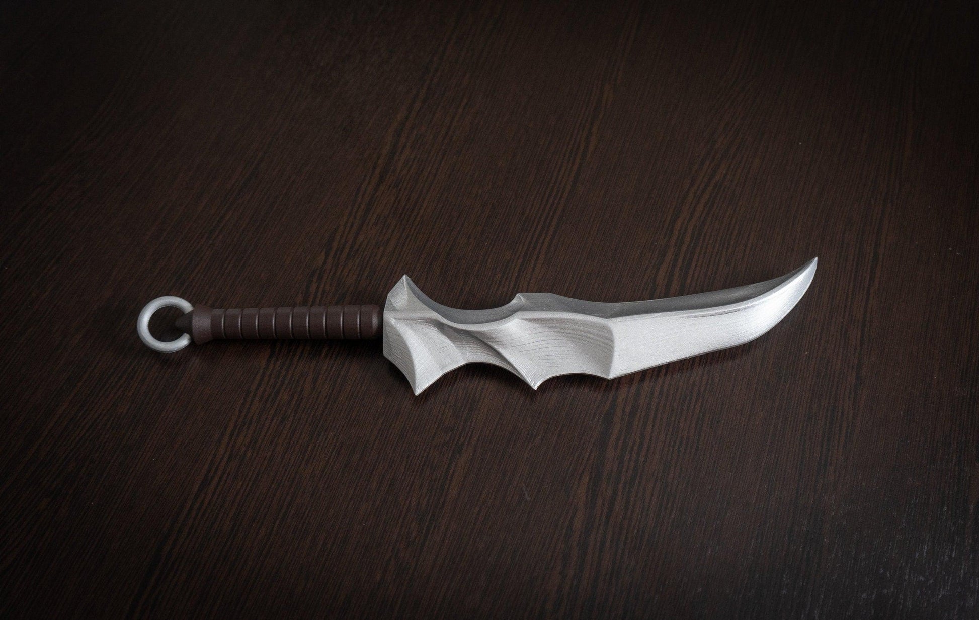 Vampire Blade cosplay prop from Overlord made of hand-painted plastic with 14.8-inch blade and brown-wrapped handle.