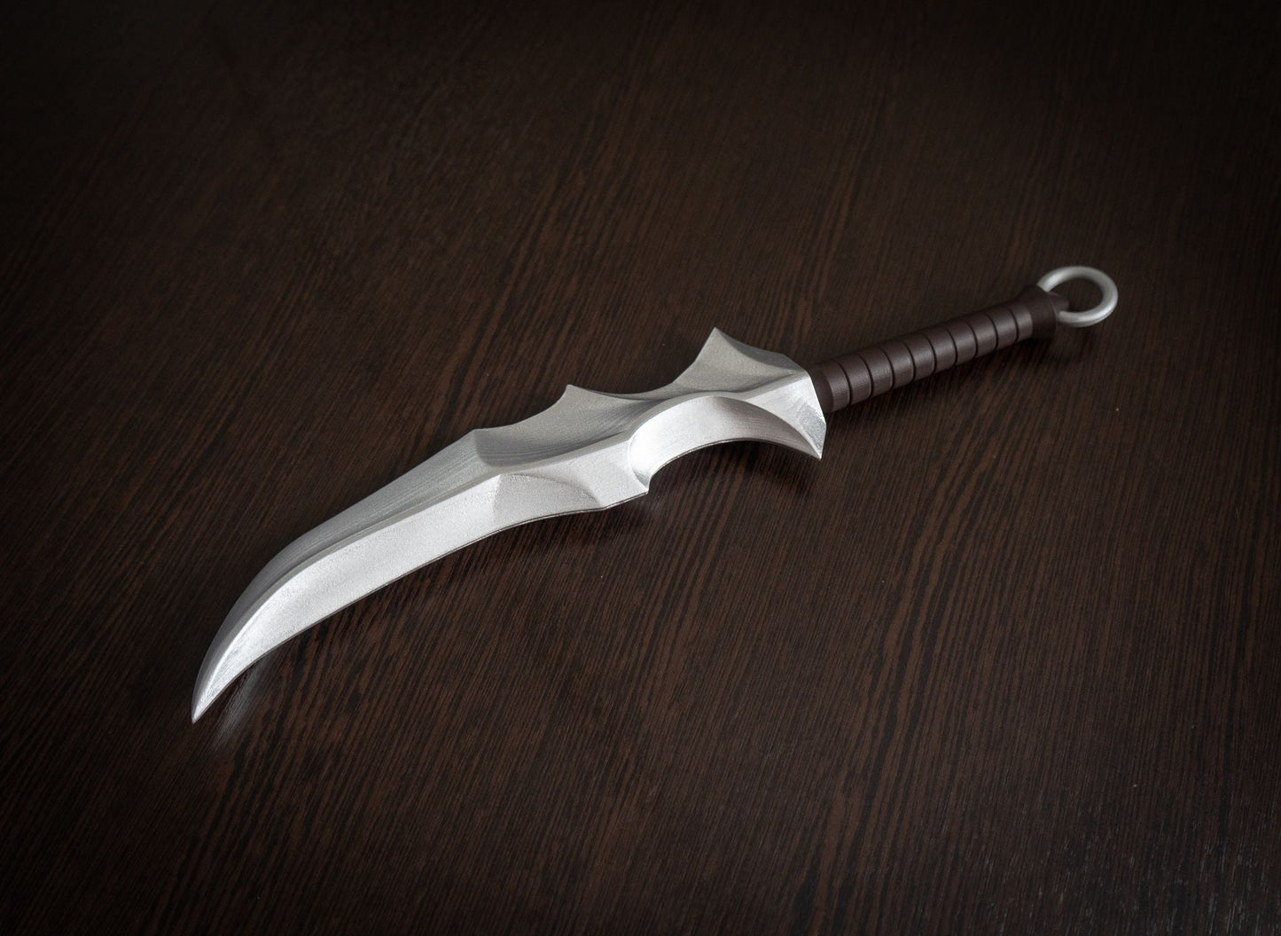 Vampire Blade cosplay prop replica inspired by Overlord, 14.8-inch hand-painted plastic dagger on dark wood surface