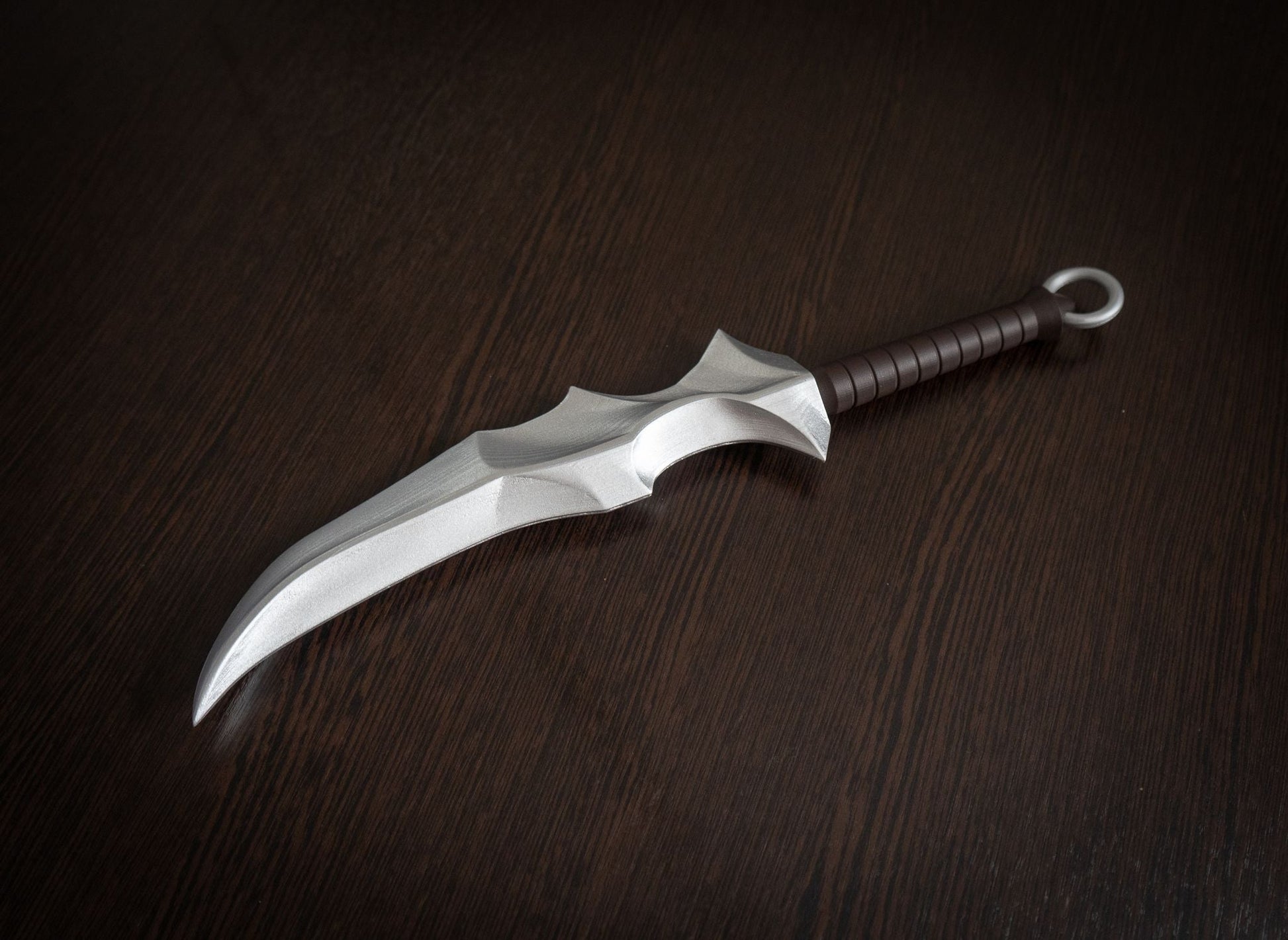 Vampire Blade cosplay prop replica inspired by Overlord, 14.8-inch hand-painted plastic dagger on dark wood surface
