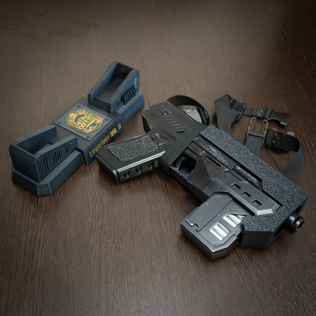 Toy gun and holster set on a wooden surface