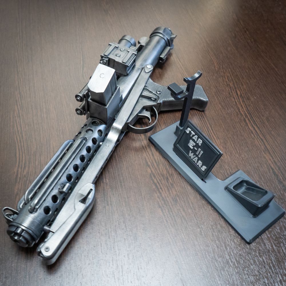 Model of a gun with a stand on a wooden surface