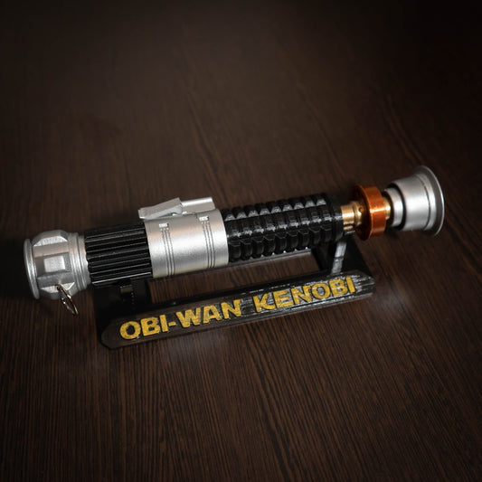 Obi-Wan Kenobi lightsaber replica on display stand with detailed black and silver design for cosplay and collectors